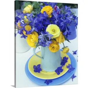 "Blue jug of yellow and blue flowers" Canvas Wall Art