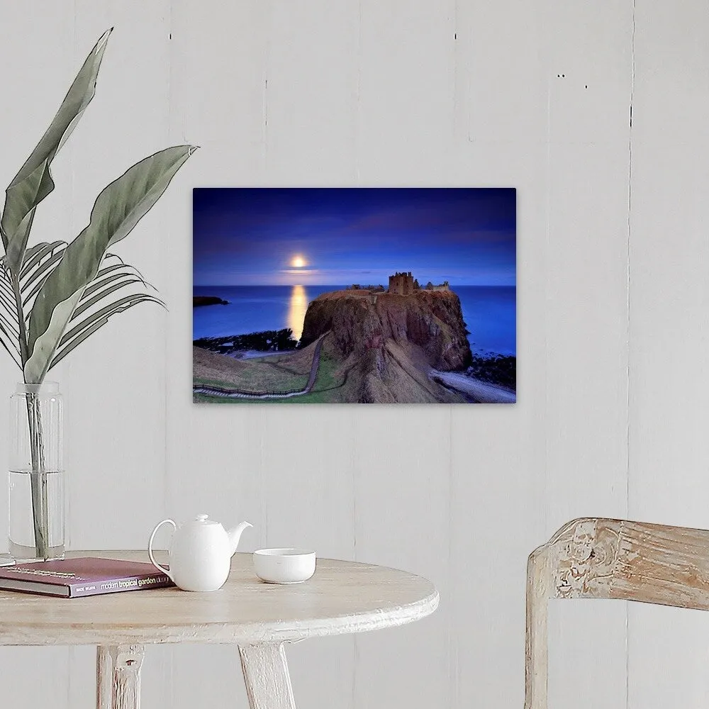 "Full moon is rising over Dunnottar castle near Stonehaven" Canvas Wall Art