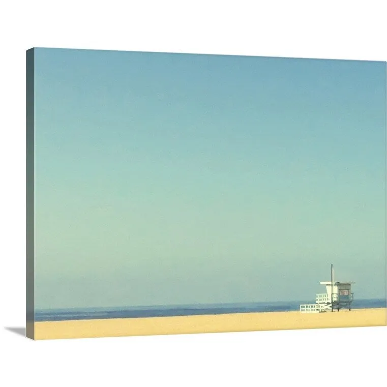"Life guard tower on beach with blue ocean and blue sky." Canvas Wall Art