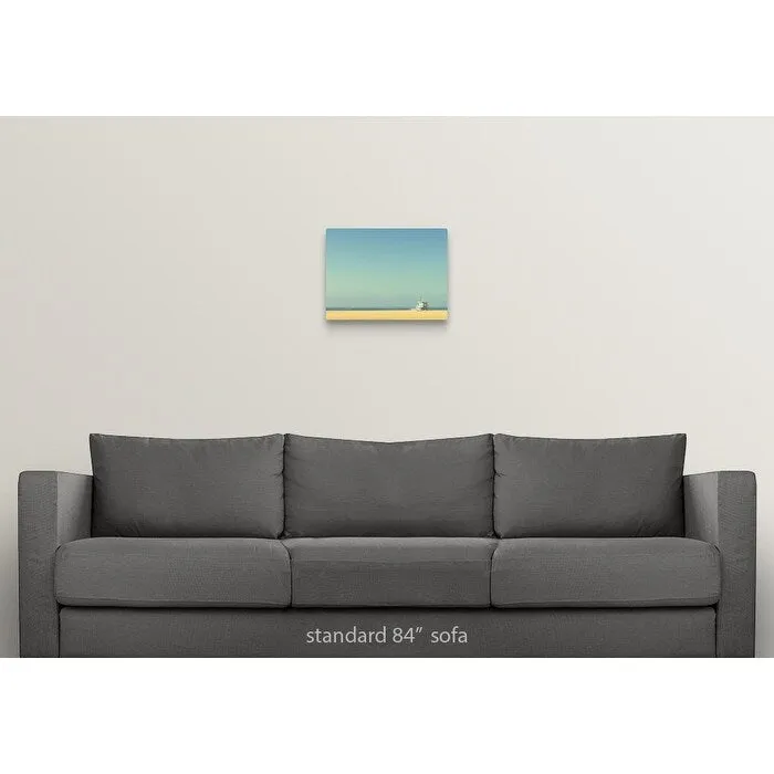 "Life guard tower on beach with blue ocean and blue sky." Canvas Wall Art